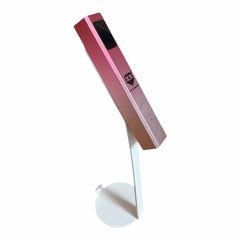 My Store HNS Diamond portable metallic pink UV nail curing lamp with an adjustable white stand for gel manicures.